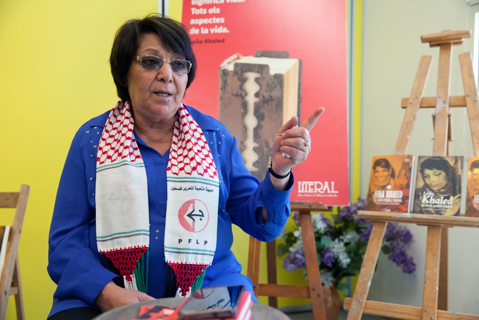 Leila Khaled speaking at a book presentation in Barcelona.